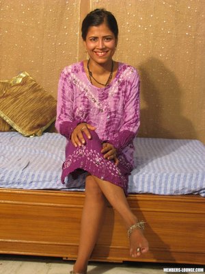 Clothed brunette solo girl Lucy Doll revealing tiny teen tits